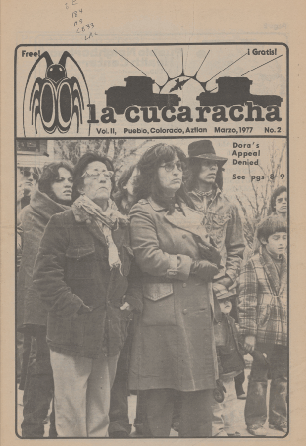 Black-and-white cover of La Cucaracha newspaper (Vol. II, Pueblo, Colorado, Aztlan, March 1977, No. 2). Masthead with a cockroach logo and vehicle silhouettes; side text reads ‘Dora’s Appeal Denied.’ Below, an outdoor photo shows a group of bundled people—women and a child—standing and looking ahead.
